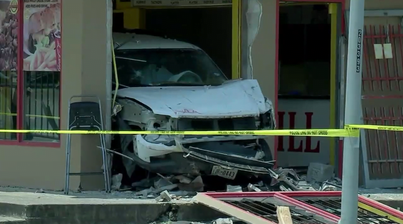 houston car accident crash into restaurant